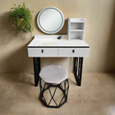 White vanity dresser with round mirror, two drawers, side open cabinet, and padded hex stool