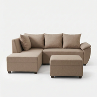 Beige sectional sofa with back cushions and ottoman pouf