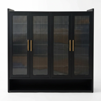 Front view of black four-door shoe cabinet with ribbed glass panels and gold-tone handles