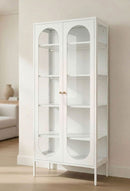 JIRAH white display cabinet with arched glass doors, adjustable shelves, and slim legs