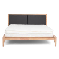 SINCLAIRE queen bed with light wood frame, charcoal upholstered headboard and white mattress