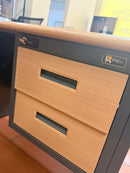 Vance Study Desk drawer close-up with two wood fronts and black inset handles