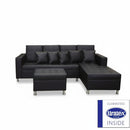 Black sectional sofa with ottoman on a white background, featuring Uraltex foam logo.